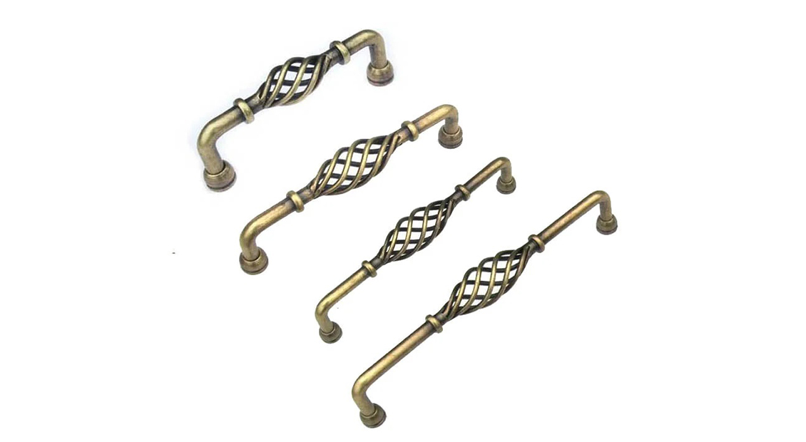 Provincial kitchen cabinet handles twist antique brass